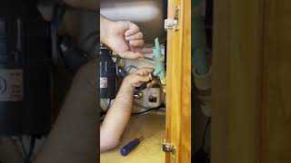 How to install a glass washer into your sink?